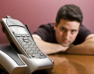 man waiting by the phone